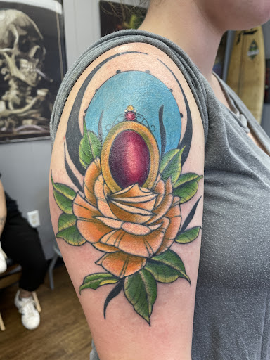 Explore hunger games tattoo ideas, creative tattoo ideas in Abilene, available at Sacred Art