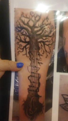 Explore iris tattoo ideas, creative tattoo ideas in Roanoke, available at Asylum Studios