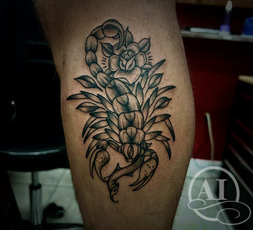 Explore grinch tattoo ideas, creative tattoo ideas in Katy, available at Artistic Impressions Tattoo Studio