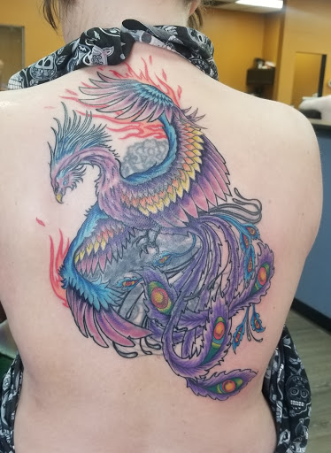 Explore male stomach tattoo ideas, creative tattoo ideas in Lafayette, available at Ink Gallery Tattoos