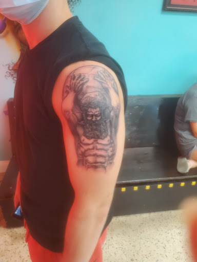 Explore childhood cancer tattoo ideas, creative tattoo ideas in New Orleans, available at Mid City Voodoux Tattoos