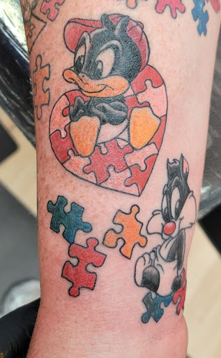 Explore under chin tattoo ideas, creative tattoo ideas in Salt Lake City, available at AWS TATTOOS PIERCING