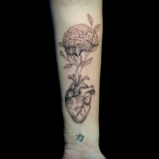 Explore back of thigh tattoo ideas, creative tattoo ideas in Chicago, available at Twisted Tattoo Studio