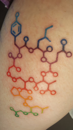 Explore honeysuckle tattoo ideas, creative tattoo ideas in Center Line, available at Elite Ink Tattoo Studios