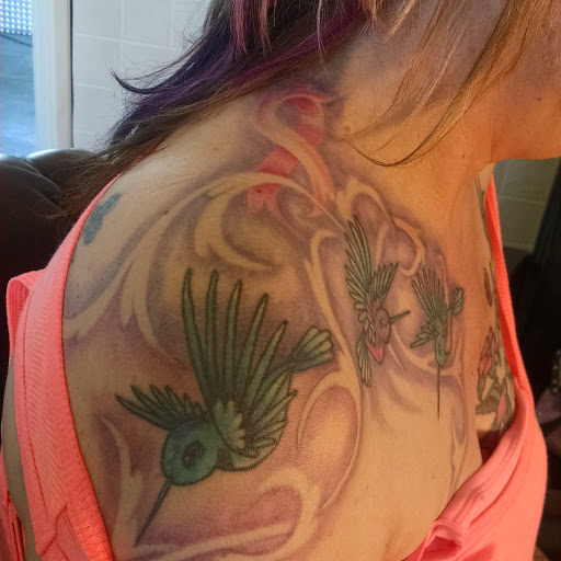 Explore black queen tattoo ideas, creative tattoo ideas in Grand Forks, available at Magoos tattoos and body piercing