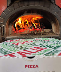 Photos du propriétaire du Pizzas à emporter Santi'Pizza au feu de bois à Garons - n°3