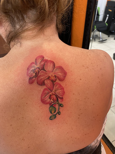 Explore mens behind the ear tattoo ideas, creative tattoo ideas in Key Largo, available at Fire Ink Tattoo