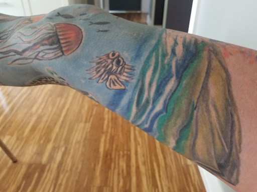 Explore greek tattoo sleeve ideas, creative tattoo ideas in Barberton, available at Magic City Tattoo Company