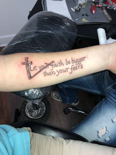 Explore knee tattoo ideas for men, creative tattoo ideas in Wake Forest, available at Revelation Ink Tattoo and Piercing