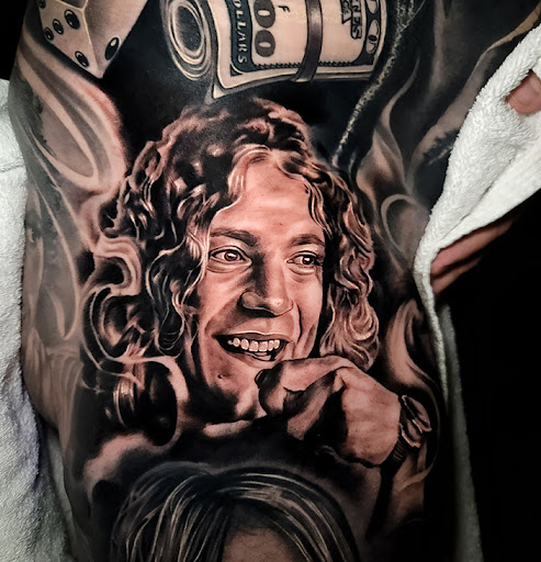 Explore mid arm tattoo ideas, creative tattoo ideas in Mesa, available at Club Tattoo