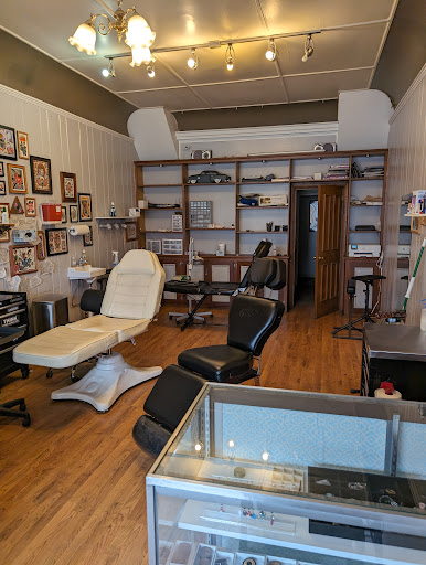 Explore jurassic park tattoo ideas, creative tattoo ideas in Owosso, available at Crimson Tattoos