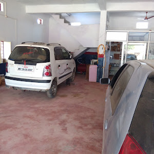 Aryan Motors. (car Autoparts Retailercar Agency All Services Is Here Whell Alingment And All Other Services) photo