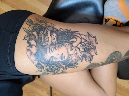 Explore knitting tattoo ideas, creative tattoo ideas in Meadville, available at Lucky Lucys Tattoo and Art Studio