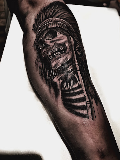 Explore bum tattoo ideas, creative tattoo ideas in Lavonia, available at 1890 Tattoo Co.