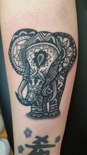 Explore thigh tattoos ideas, creative tattoo ideas in Fayette, available at Last Stand Tattoo