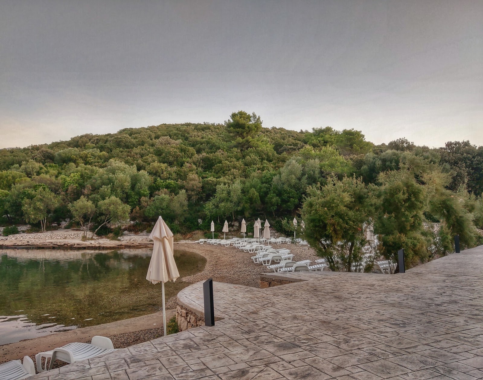 Punta Kriza beach'in fotoğrafı ve yerleşim