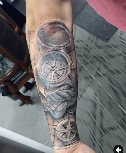 Explore hand tattoo ideas male, creative tattoo ideas in Middletown, available at Traditionally Twisted Tattoo