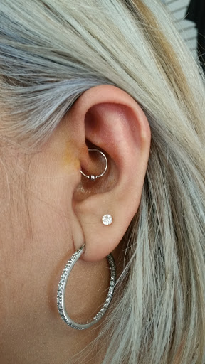 Explore skeleton hand tattoo ideas, creative tattoo ideas in Arlington, available at Urbans Tattoo & Piercing Studio