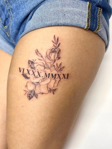 Explore butterfly flower tattoo ideas, creative tattoo ideas in Houston, available at 333 Tattoo Studio HTX
