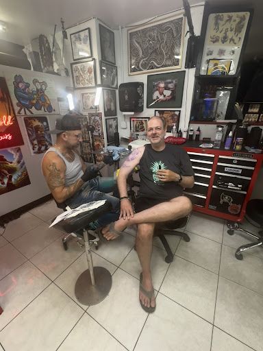 Explore half sleeve men tattoo ideas, creative tattoo ideas in Honolulu, available at Sacred Art Tattoo Waikiki