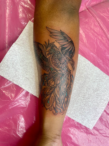 Explore shoulder tattoo ideas for men, creative tattoo ideas in Lake City, available at Crooked Spines Tattoo Studio