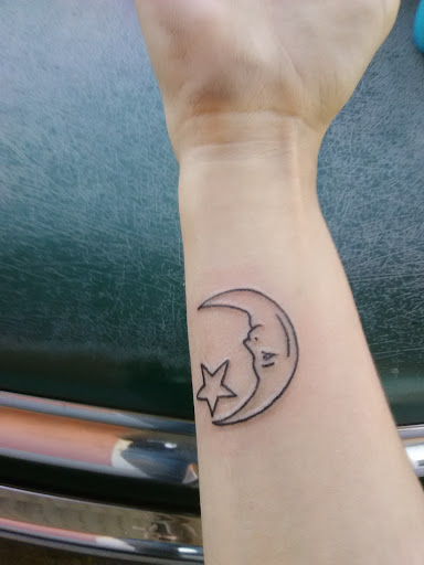 Explore cross tattoo cover up ideas, creative tattoo ideas in Biloxi, available at Carnivale Tattoo