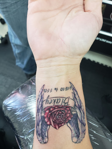 Explore country tattoo ideas for guys, creative tattoo ideas in Grand Rapids, available at Screaming Needle Tattoo & Body Piercing Studios