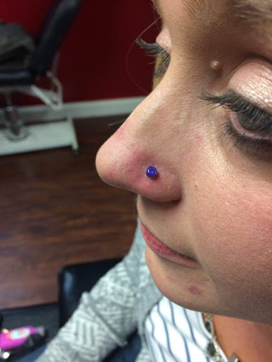 Explore cherry tattoo ideas, creative tattoo ideas in Powell, available at Against All Odds Tattoos and Piercings