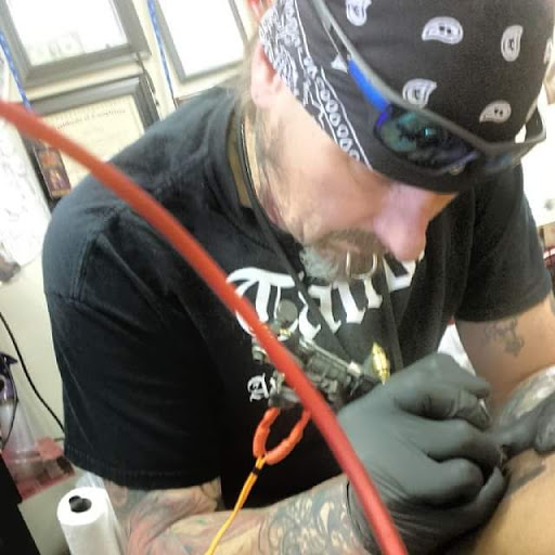 Find finger tattoo ideas for men for your next unique tattoo in Charlotte at Black Cloud Tattoo & Piercing