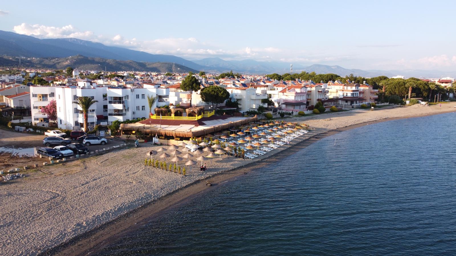 Fotografija Gulsah beach z kevyt hiekka ja kivi površino