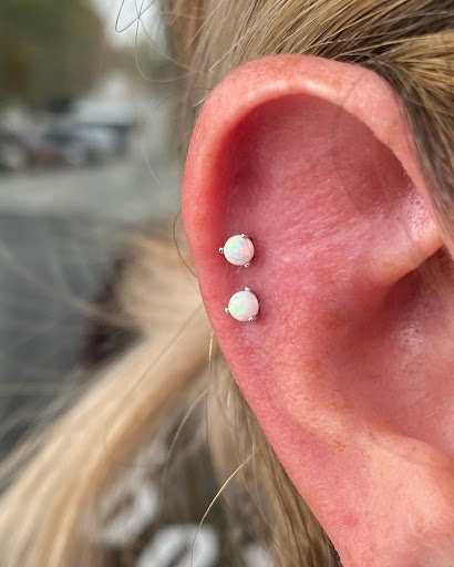 Explore 2 sons tattoo ideas, creative tattoo ideas in Dover, available at Agap Body Piercings