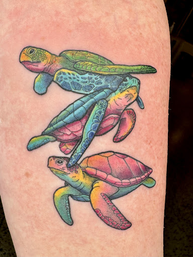 Explore ladies arm tattoo ideas, creative tattoo ideas in Broxton, available at Seratonin Tattoo Parlor