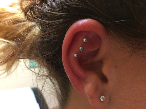 Explore apple tattoo ideas, creative tattoo ideas in San Diego, available at Body Art Salon