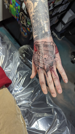 Explore nail tech tattoo ideas, creative tattoo ideas in Anchorage, available at Ultra Violence Tattoo co.