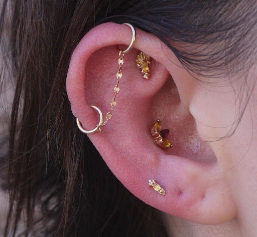 Find face tattoo idea for your next unique tattoo in San Jose at Make Me Holey Body Piercing
