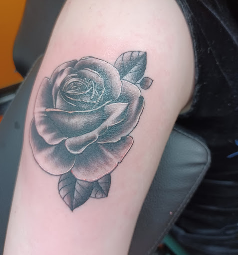 Explore simple spine tattoo ideas, creative tattoo ideas in Marion, available at Peezys Tattoos & Body Piercings