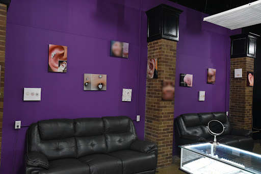 Explore full neck tattoo ideas, creative tattoo ideas in Kalamazoo, available at Kitten Flower Boutique Jewelry and Body Piercing