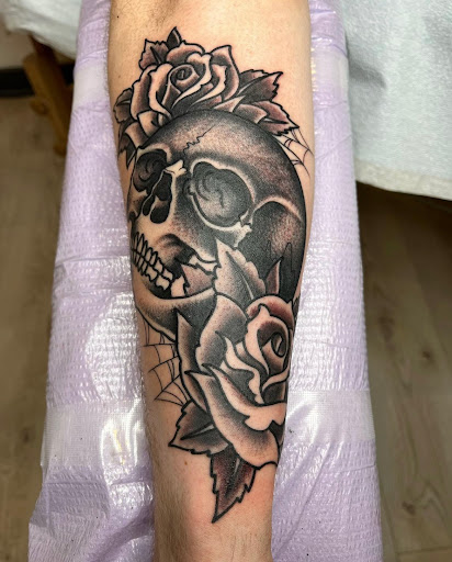 Explore loner tattoo ideas, creative tattoo ideas in Arlington, available at Benchmark Tattoos