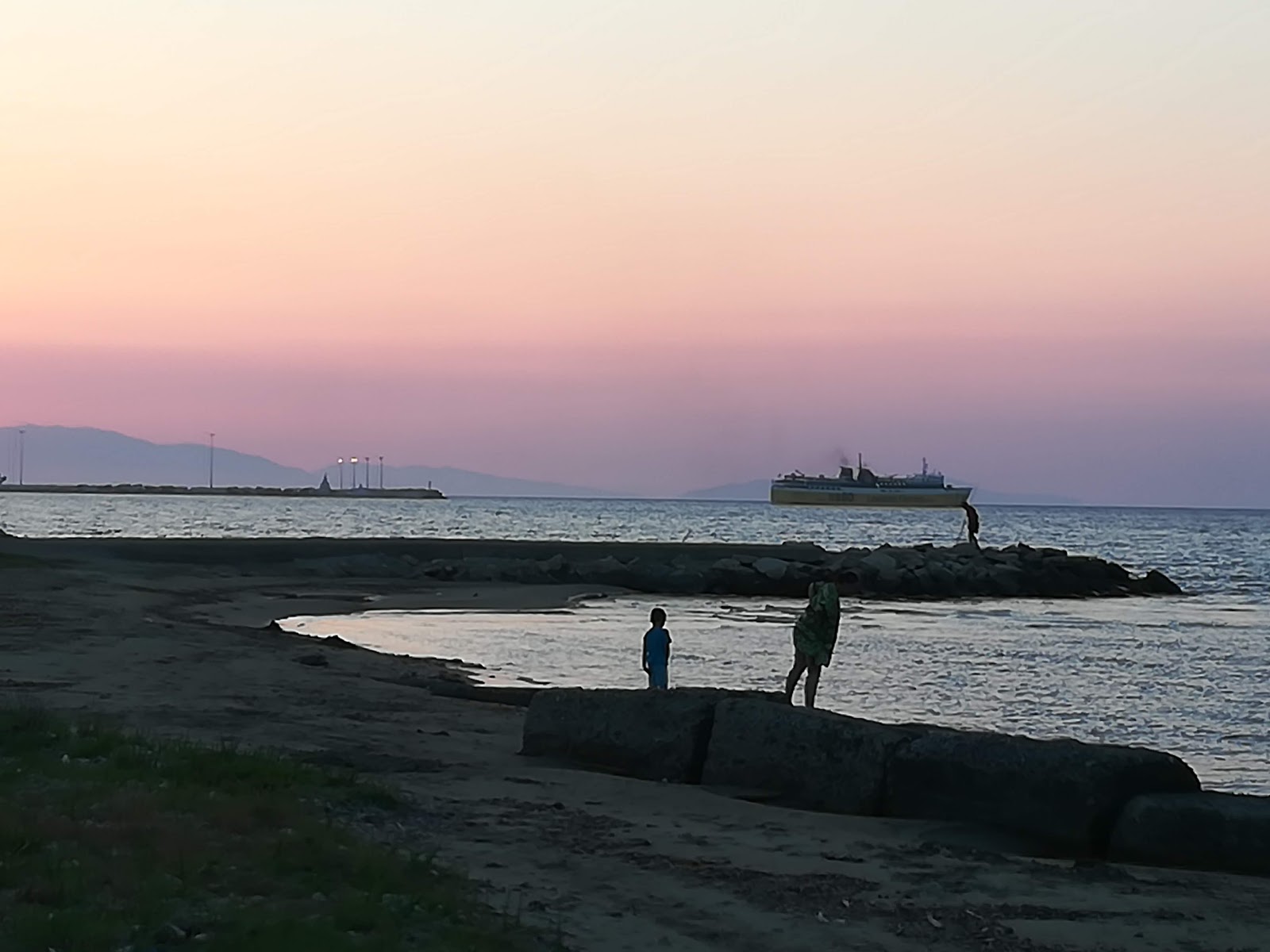 Foto di Mimoza beach con una superficie del sabbia marrone