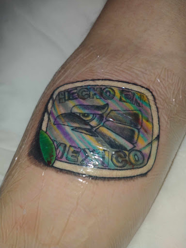 Explore love heart tattoo ideas, creative tattoo ideas in Winter Park, available at Forged Empire Tattoo Studio