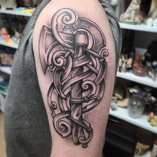 Explore small leg tattoo ideas, creative tattoo ideas in Lewisburg, available at Rose and Dagger Tattoo