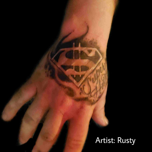 Tattoo Shop «West Coast Tattoos», reviews and photos, 719 E Tennessee St, Florence, AL 35630, USA