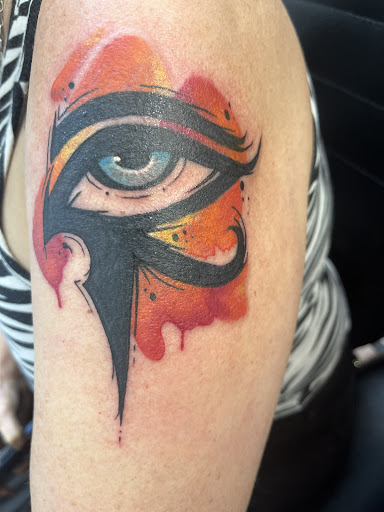 Explore bookish tattoo ideas, creative tattoo ideas in Cocoa, available at Rorschach Tattoo Shop and Piercing Studio