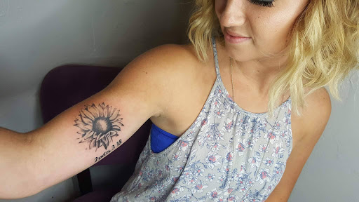 Explore cross tattoo ideas for females, creative tattoo ideas in Springfield, available at Ink Ink Tattoo & Piercing Studio