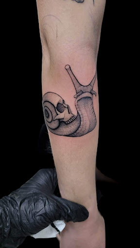 Explore cowboy hat tattoo ideas, creative tattoo ideas in Crystal City, available at Meraki Tattoo and Piercing