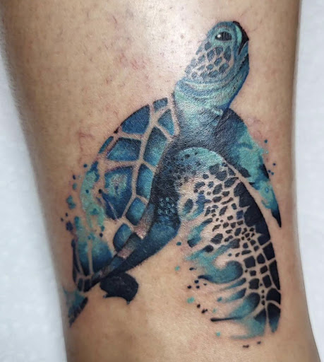 Explore men's arm sleeve tattoo ideas, creative tattoo ideas in Okeechobee, available at Muck City Tattoos & Piercings