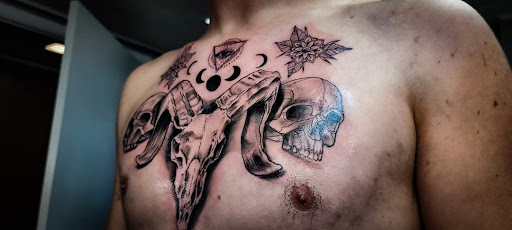 Explore bicep tattoo ideas for men, creative tattoo ideas in Minocqua, available at Whisky Rose Tattoo Parlor