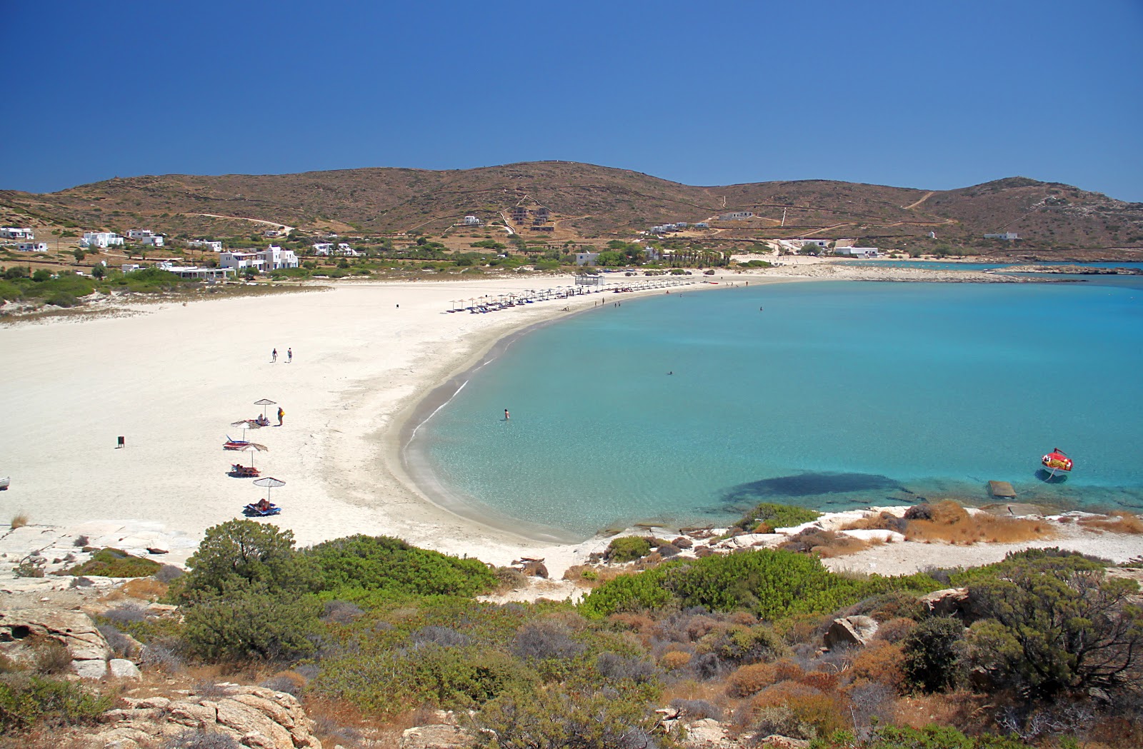 Foto de Praia de Magganari com areia fina e brilhante superfície