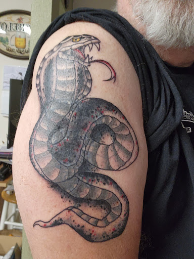 Explore son and mother tattoos ideas, creative tattoo ideas in Snohomish, available at Unknown Tattoo Co.