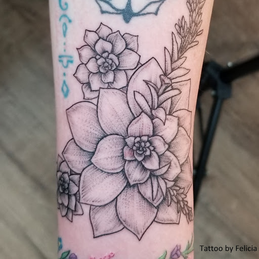 Explore male back tattoo ideas, creative tattoo ideas in Fort Myers, available at Tiger Lotus Tattoo and Piercing